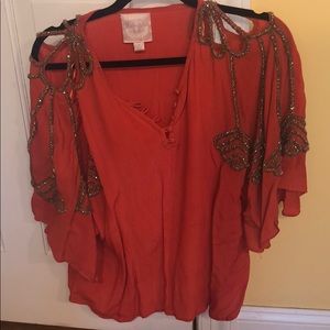 Orange blouse with gold shoulder details size Med